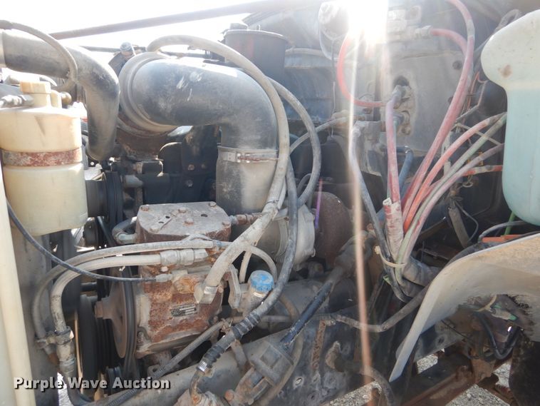 image for item JG9144 1987 Ford F700  flatbed truck