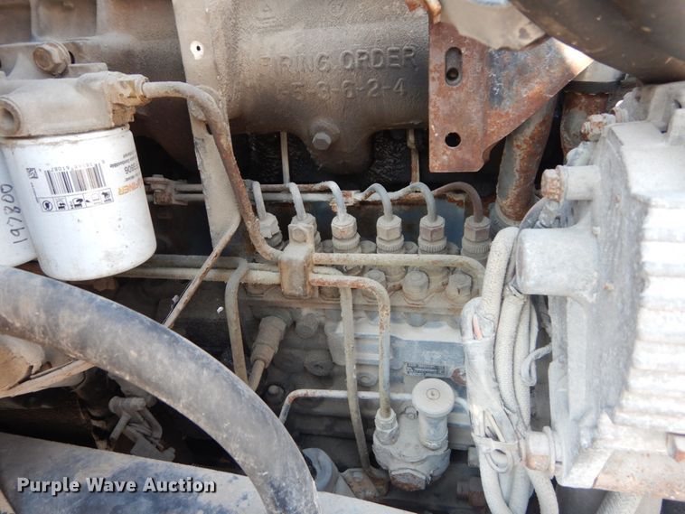 image for item JG9144 1987 Ford F700  flatbed truck