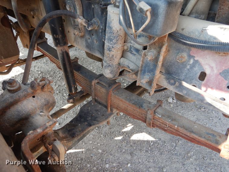 image for item JG9144 1987 Ford F700  flatbed truck