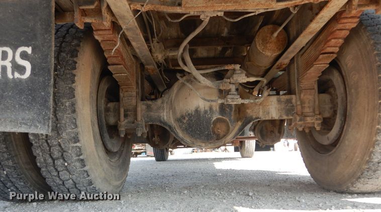 image for item JG9144 1987 Ford F700  flatbed truck