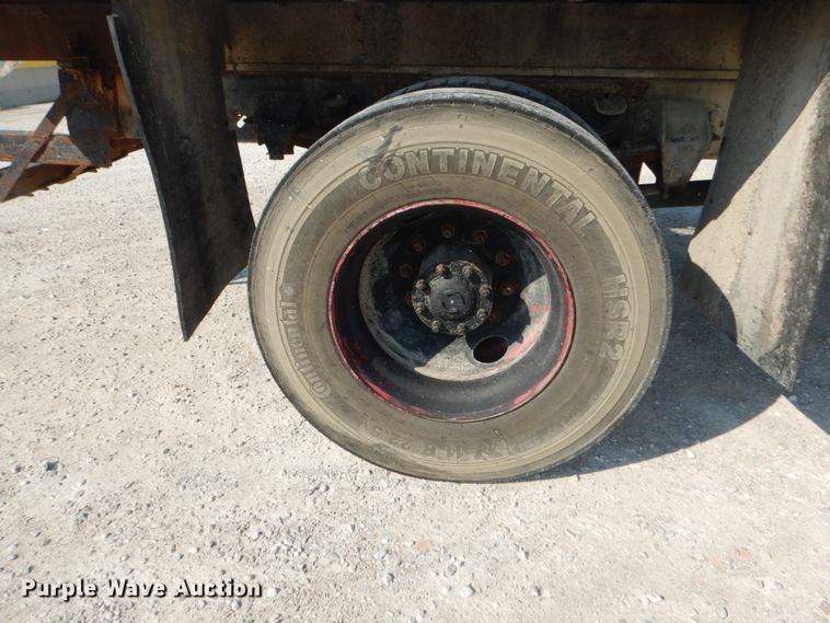 image for item JG9144 1987 Ford F700  flatbed truck