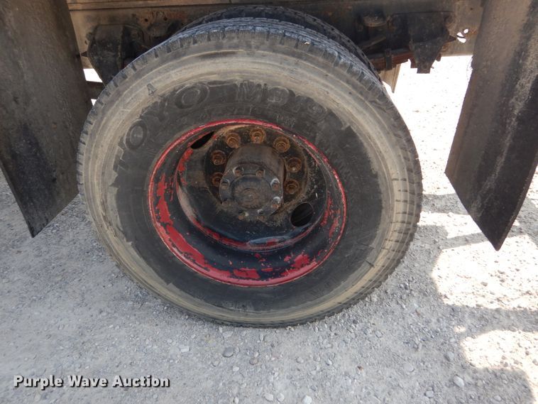 image for item JG9144 1987 Ford F700  flatbed truck