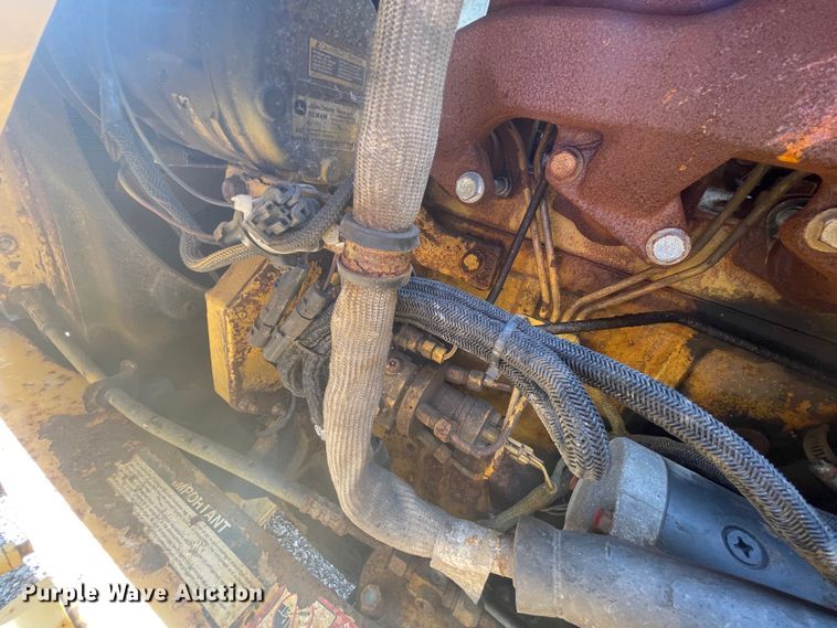 image for item JQ9638 2003 John Deere 310G  backhoe