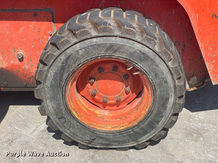 image for item JQ9640 1999 Gehl 5635DX  skid steer loader