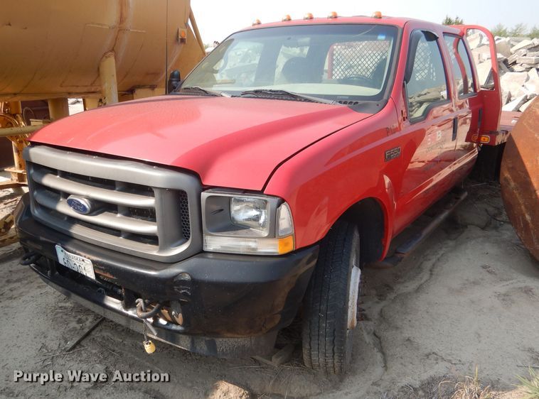 image for item HU9284 2002 Ford F550 Super Duty XL  Crew Cab flatbed truck