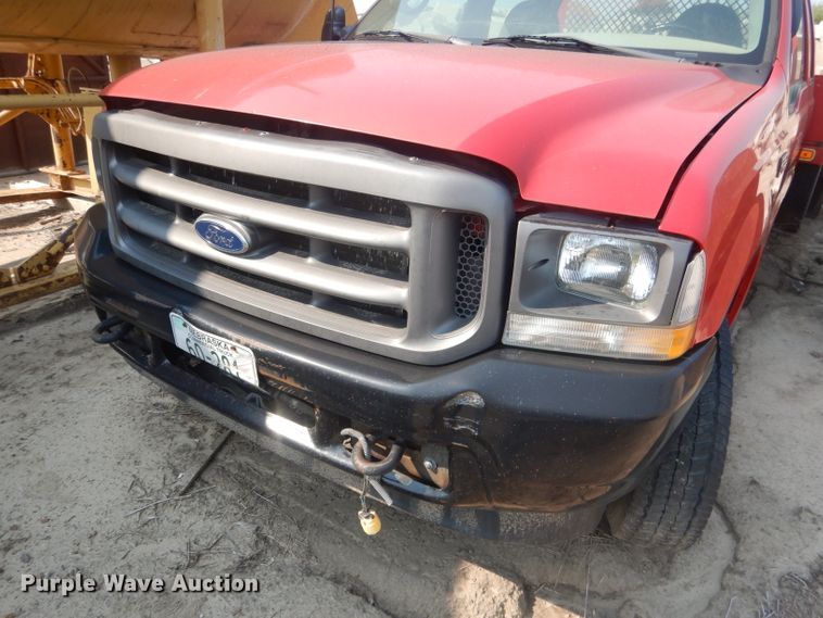 image for item HU9284 2002 Ford F550 Super Duty XL  Crew Cab flatbed truck