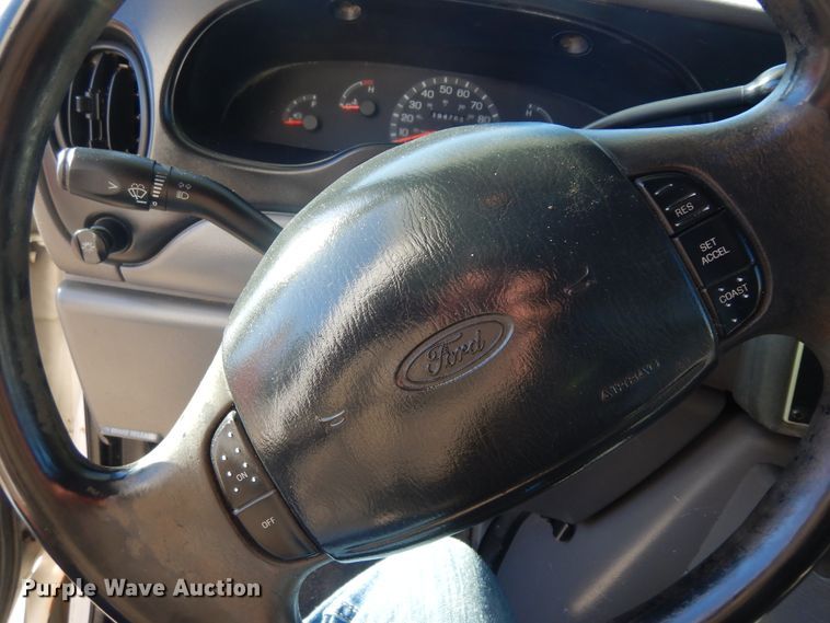 image for item KU9133 2001 Ford E350 Super Duty  shuttle bus