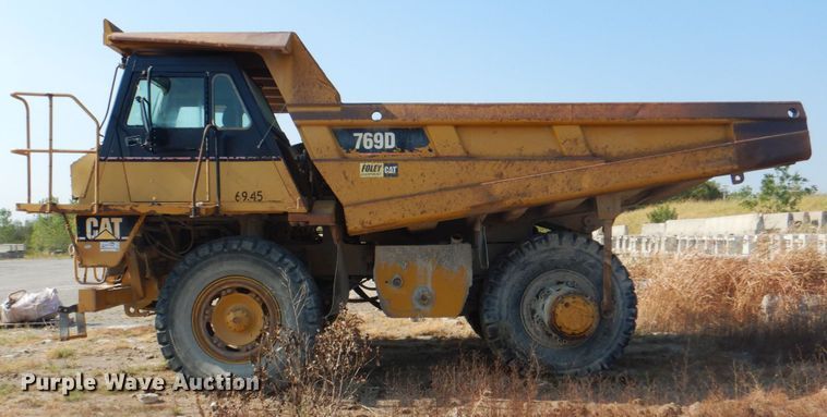 image for item DG1717 2004 Caterpillar 769D  haul truck