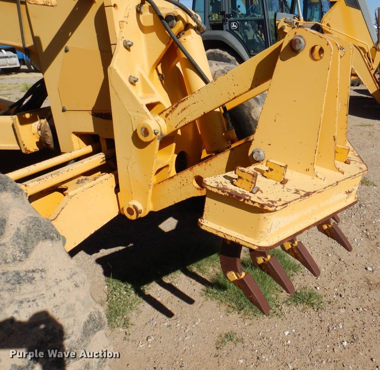 image for item DI5743 2002 John Deere 670C  motor grader