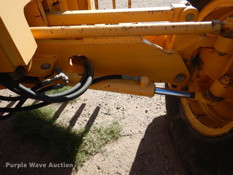 image for item DI5743 2002 John Deere 670C  motor grader