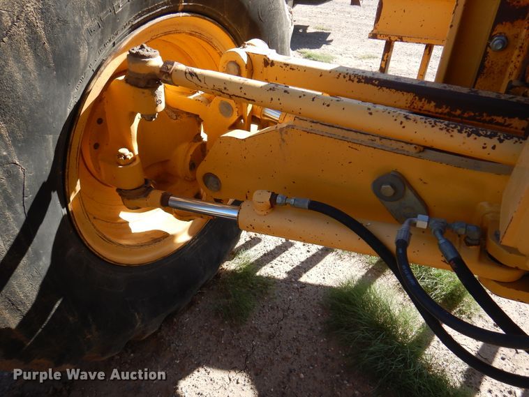 image for item DI5743 2002 John Deere 670C  motor grader