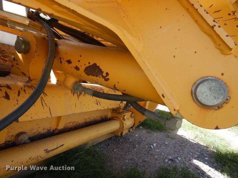 image for item DI5743 2002 John Deere 670C  motor grader