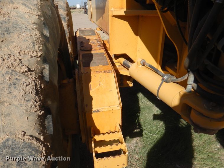 image for item DI5743 2002 John Deere 670C  motor grader