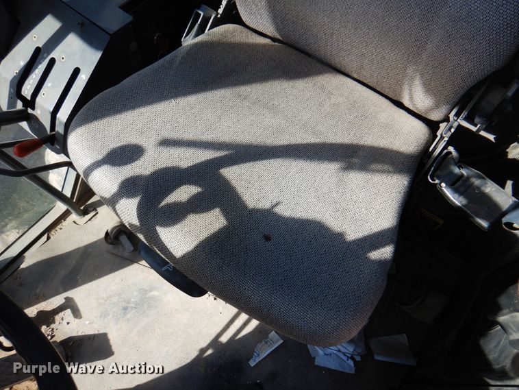 image for item DI5743 2002 John Deere 670C  motor grader