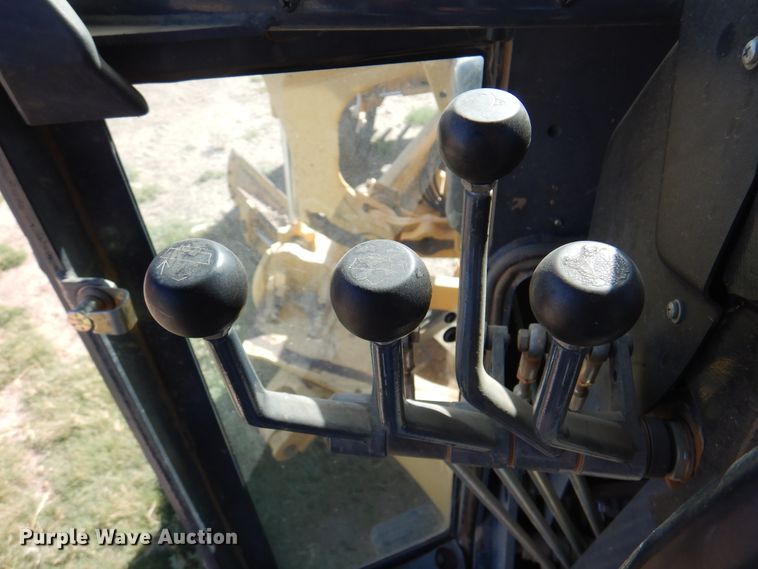 image for item DI5743 2002 John Deere 670C  motor grader