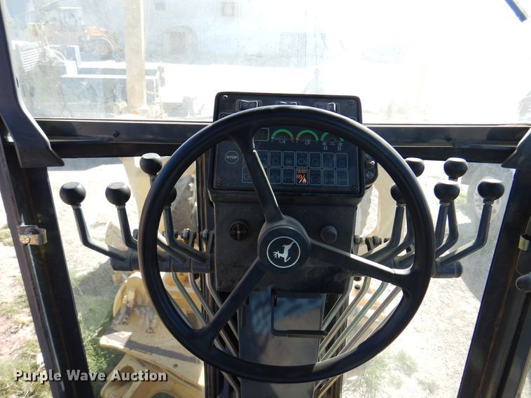 image for item DI5743 2002 John Deere 670C  motor grader