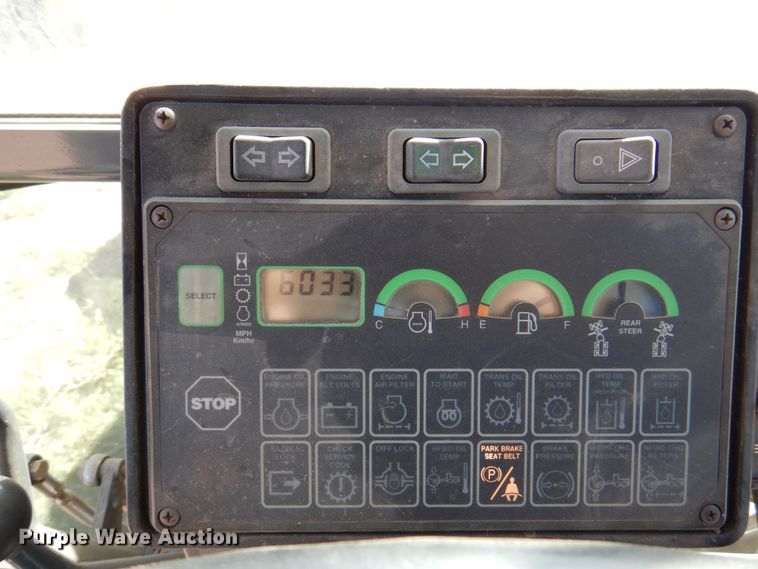 image for item DI5743 2002 John Deere 670C  motor grader