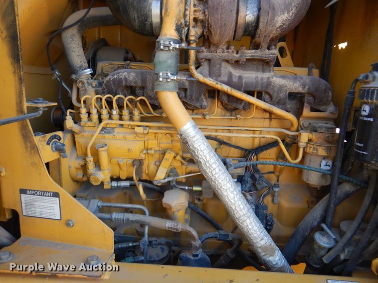 image for item DI5743 2002 John Deere 670C  motor grader