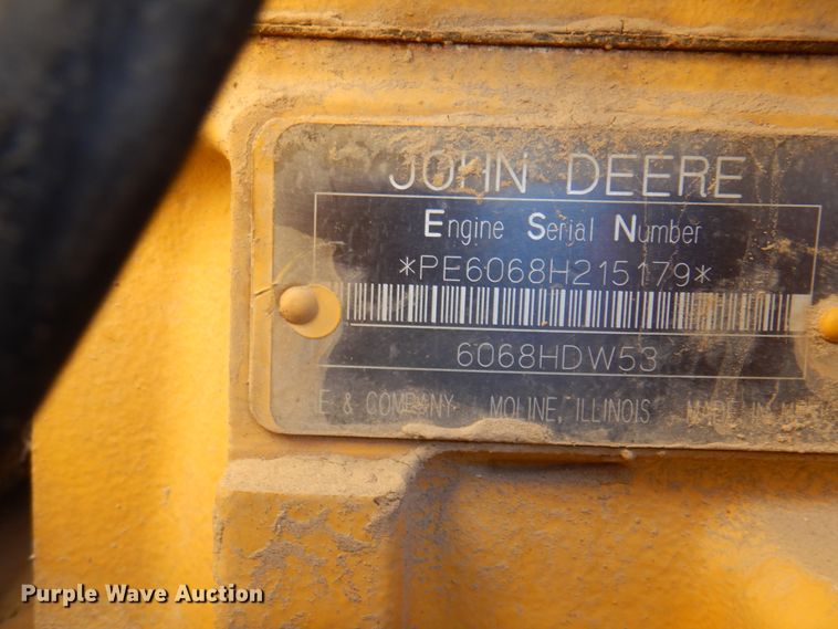 image for item DI5743 2002 John Deere 670C  motor grader