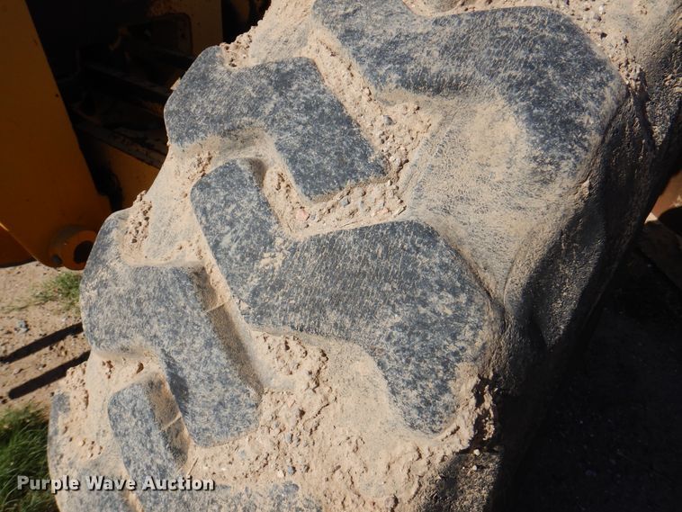 image for item DI5743 2002 John Deere 670C  motor grader