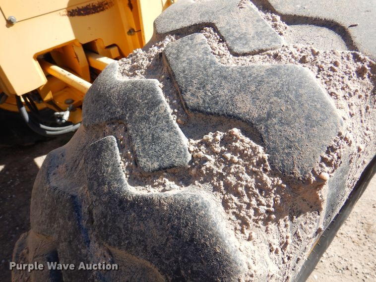 image for item DI5743 2002 John Deere 670C  motor grader