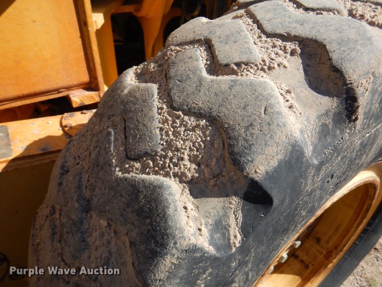 image for item DI5743 2002 John Deere 670C  motor grader