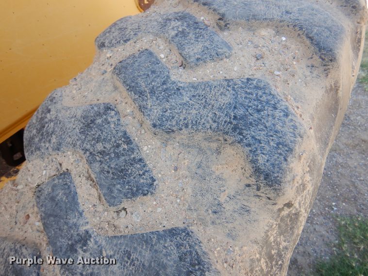 image for item DI5743 2002 John Deere 670C  motor grader