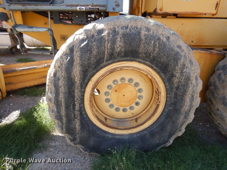 image for item DI5743 2002 John Deere 670C  motor grader