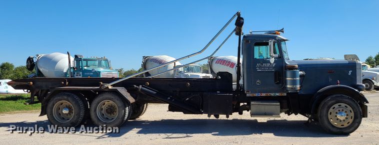 image for item IC9988 1984 Peterbilt 359  roll-off container truck