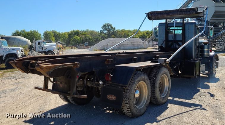 image for item IC9988 1984 Peterbilt 359  roll-off container truck