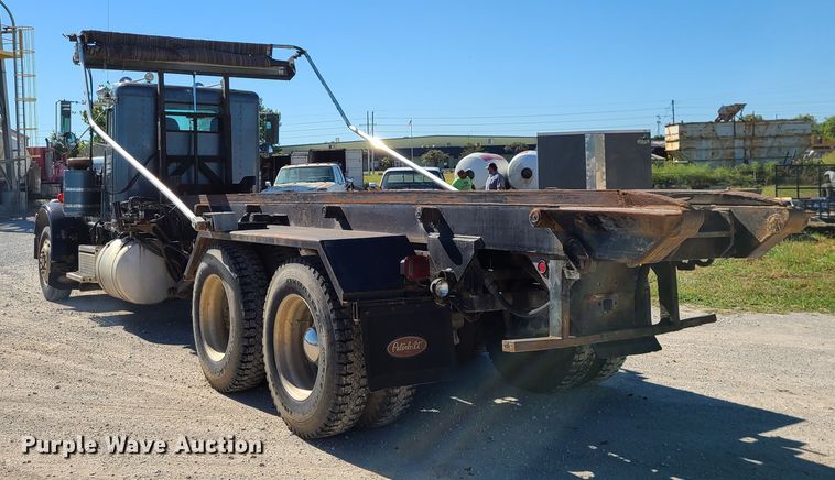 image for item IC9988 1984 Peterbilt 359  roll-off container truck