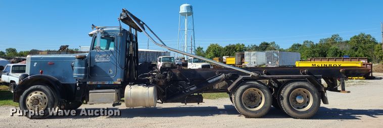 image for item IC9988 1984 Peterbilt 359  roll-off container truck