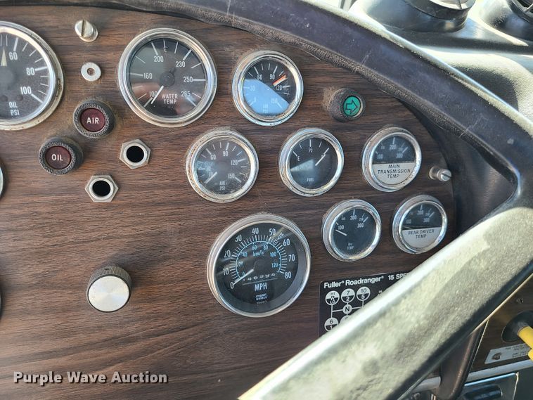 image for item IC9988 1984 Peterbilt 359  roll-off container truck