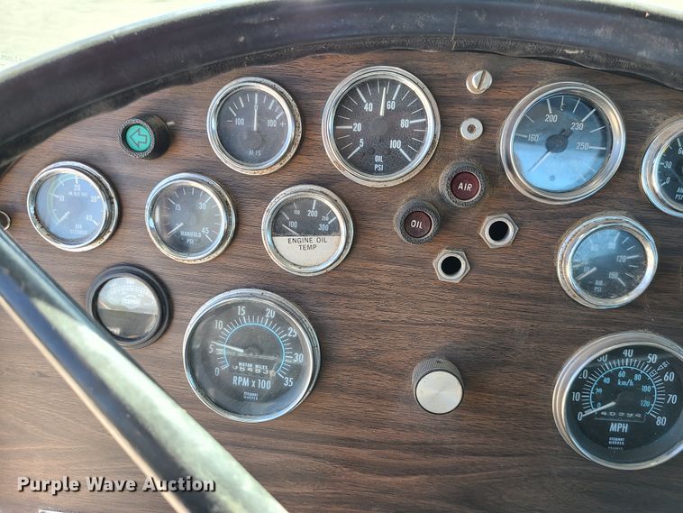 image for item IC9988 1984 Peterbilt 359  roll-off container truck