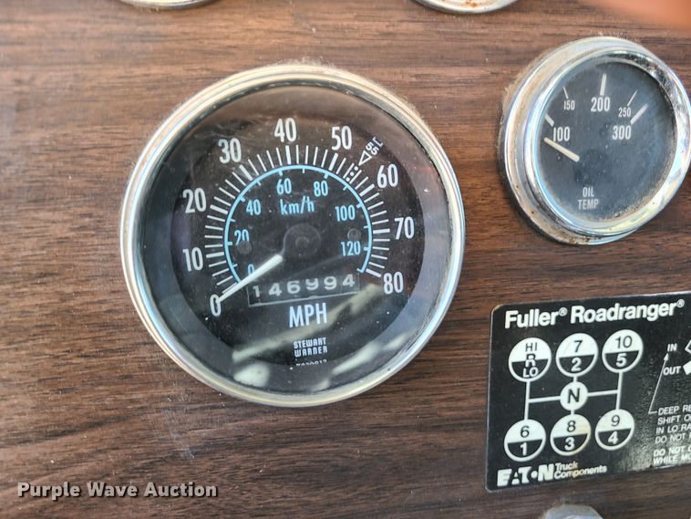 image for item IC9988 1984 Peterbilt 359  roll-off container truck