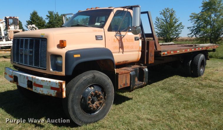 image for item JG9129 2002 GMC 7500  rollback truck