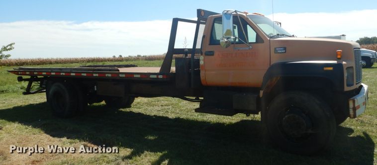 image for item JG9129 2002 GMC 7500  rollback truck