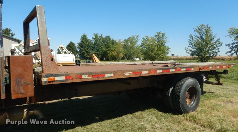 image for item JG9129 2002 GMC 7500  rollback truck