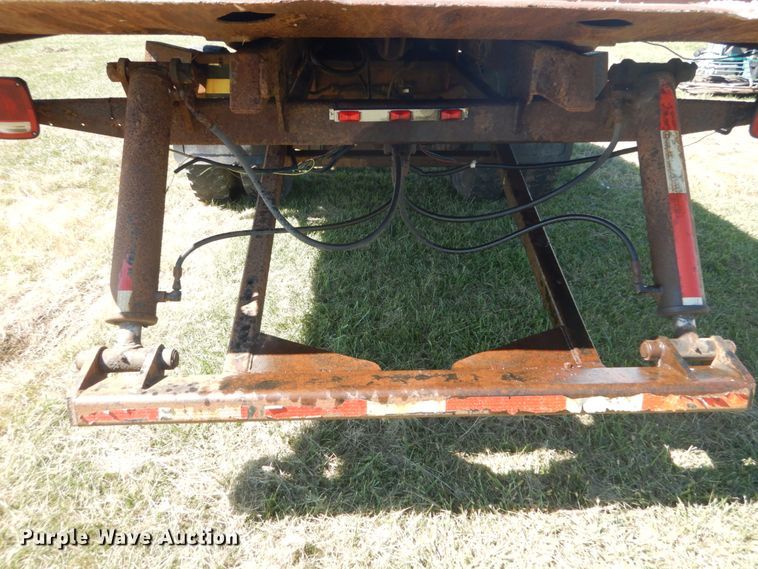 image for item JG9129 2002 GMC 7500  rollback truck