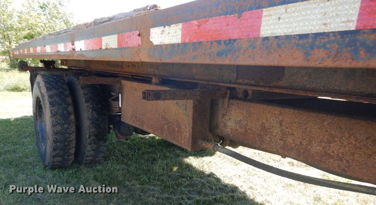 image for item JG9129 2002 GMC 7500  rollback truck