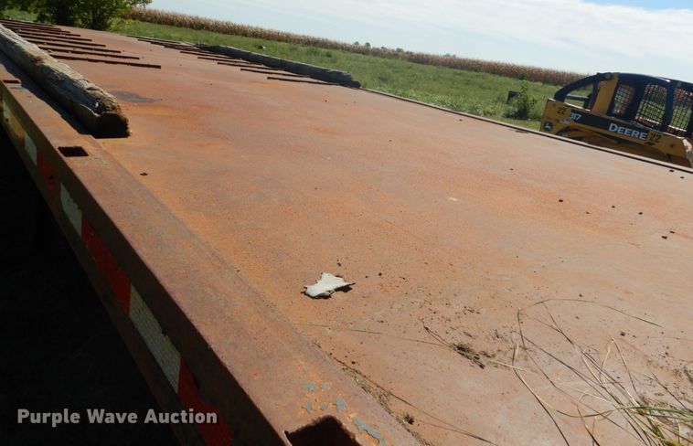 image for item JG9129 2002 GMC 7500  rollback truck