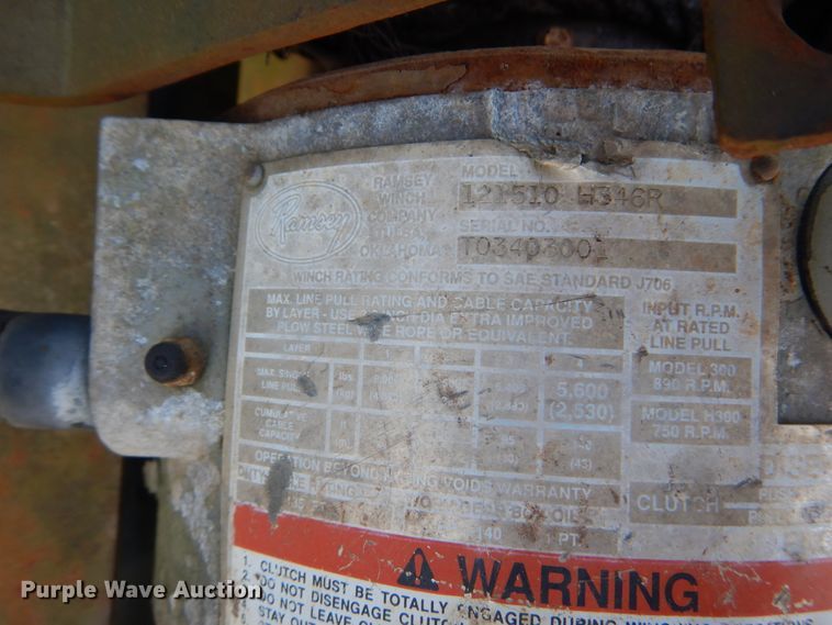 image for item JG9129 2002 GMC 7500  rollback truck