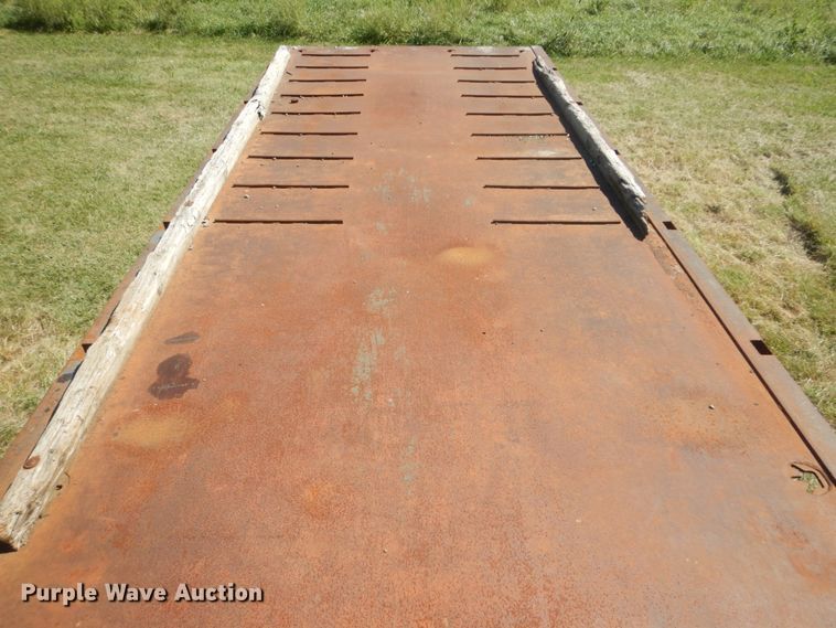 image for item JG9129 2002 GMC 7500  rollback truck