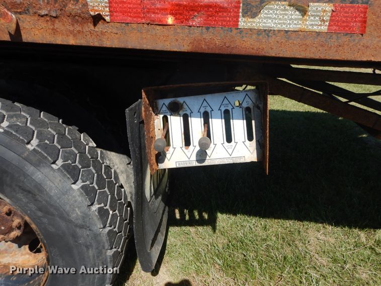 image for item JG9129 2002 GMC 7500  rollback truck