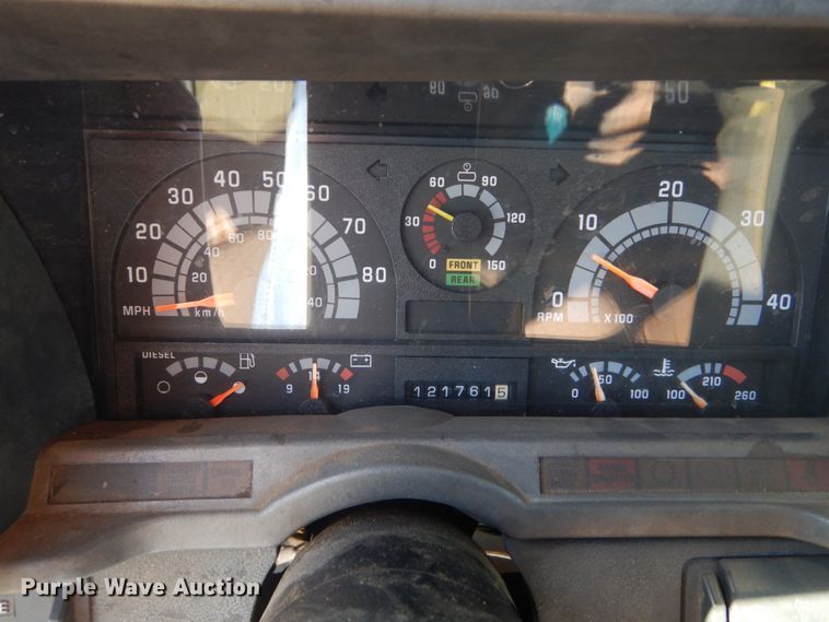 image for item JG9129 2002 GMC 7500  rollback truck