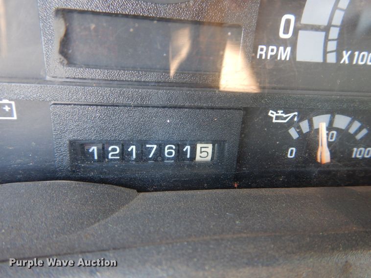 image for item JG9129 2002 GMC 7500  rollback truck