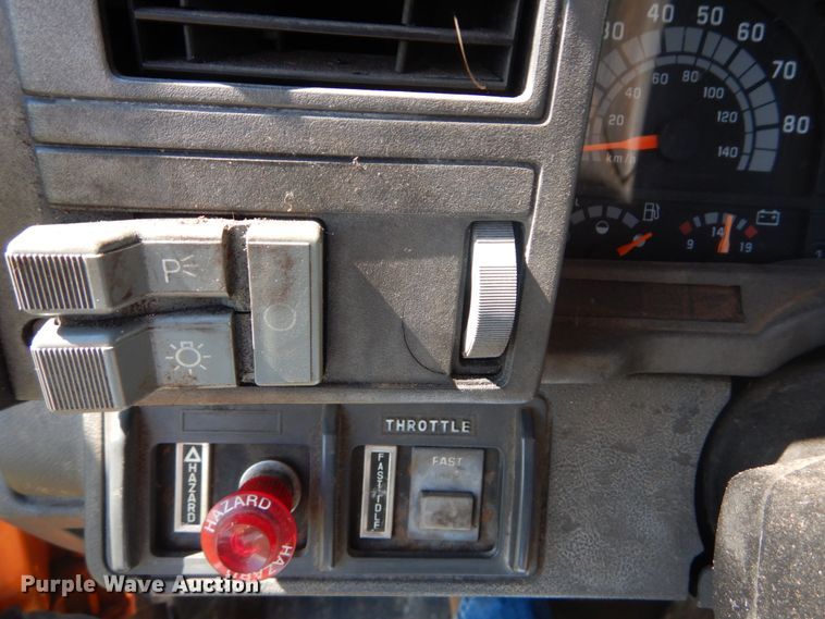 image for item JG9129 2002 GMC 7500  rollback truck