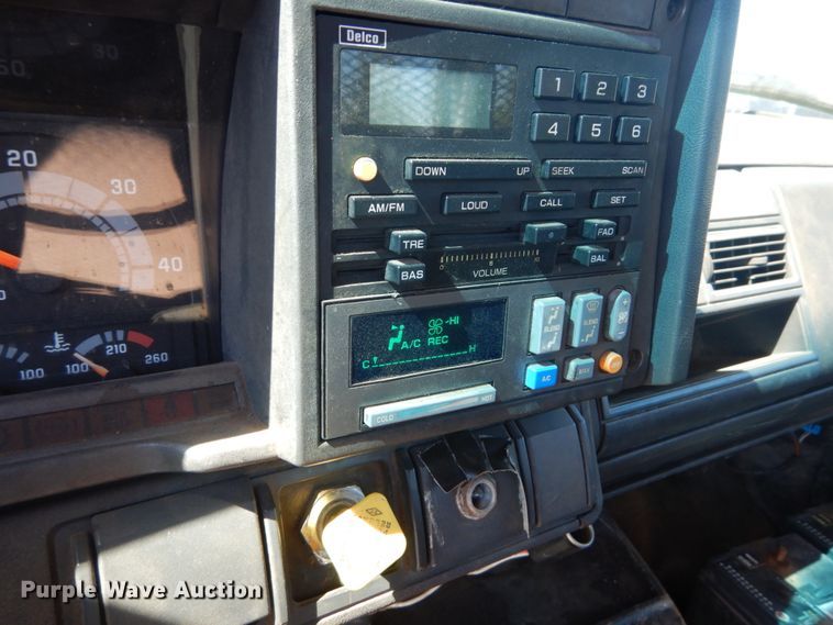 image for item JG9129 2002 GMC 7500  rollback truck