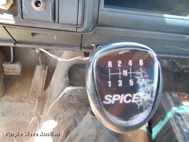 image for item JG9129 2002 GMC 7500  rollback truck