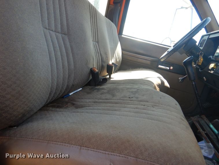 image for item JG9129 2002 GMC 7500  rollback truck